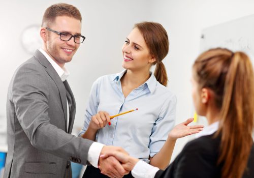 Picture showing manager introducing new worker to the team